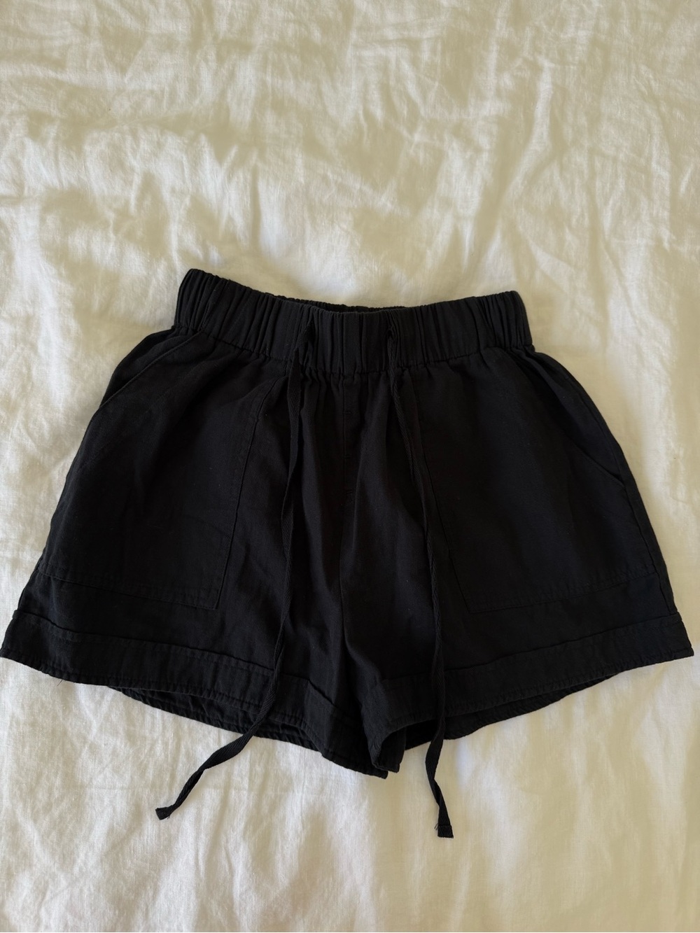 Black drawstring shorts